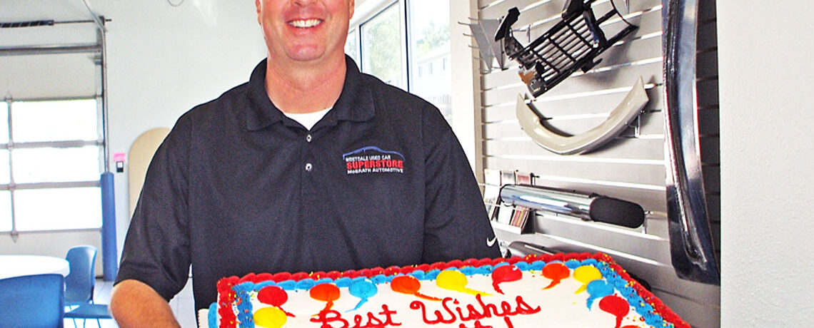 Scott Winker with a Cake