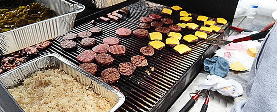 Burgers Being Grilled at Staff Potluck