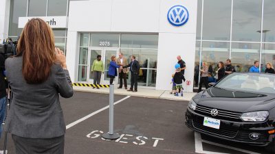 Hand shaking at the Volkswagen grand opening 