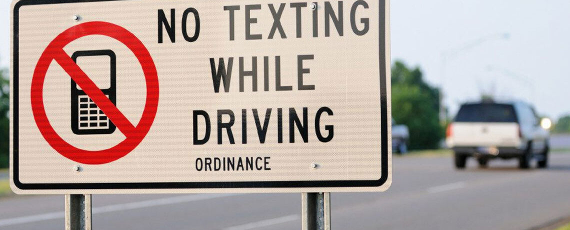 Texting while driving sign