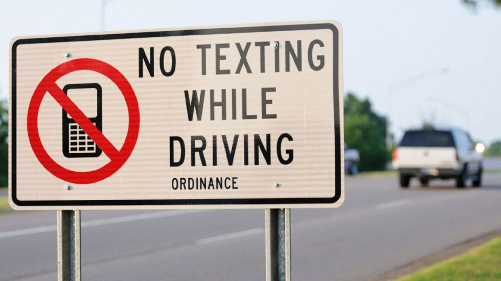 Texting while driving sign