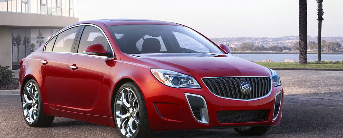 Red 2014 Buick Regal in the tropics