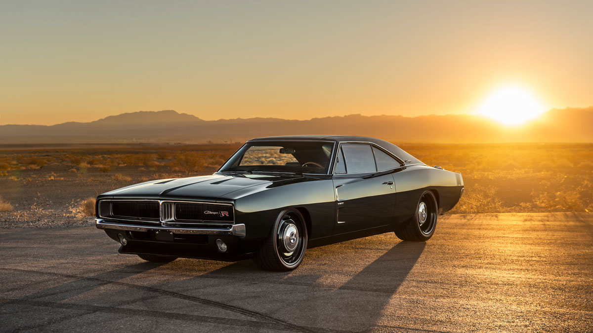 1968 Dodge Charger on a road at sunset