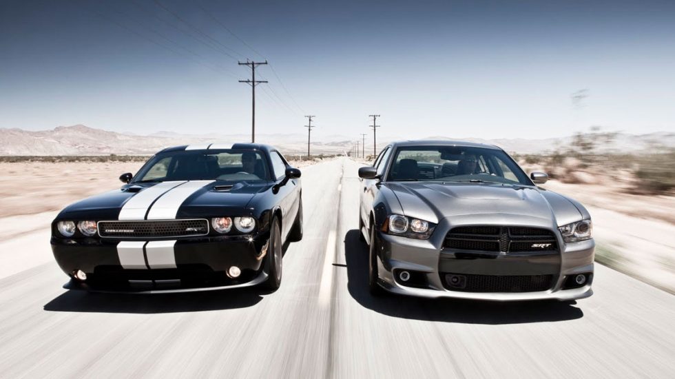 Dodge Charger and Dodge Challenger driving side by side